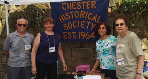 Gary, Debby, Georgina and Edna manning the  Chester Historical Society booth at the Music Festival 2017-08-12.